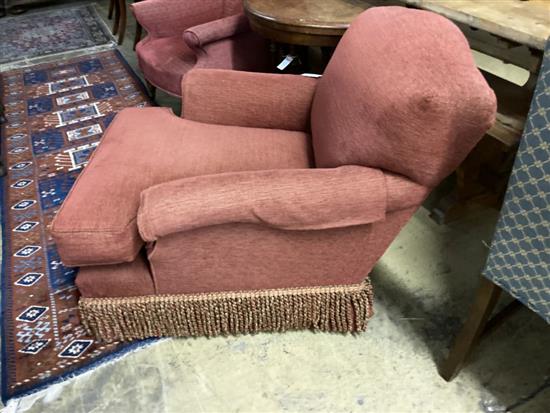 A modern red upholstered armchair, width 88cm, depth 100cm, height 80cm